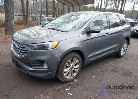 2022 Ford Edge Titanium z USA, uszkodzony, nr VIN 2FMPK4K95NBB07090